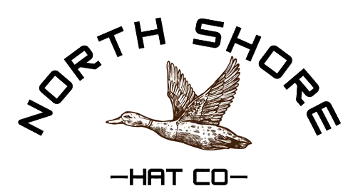 Logo of North Shore Hat Co with a duck illustration on a white background